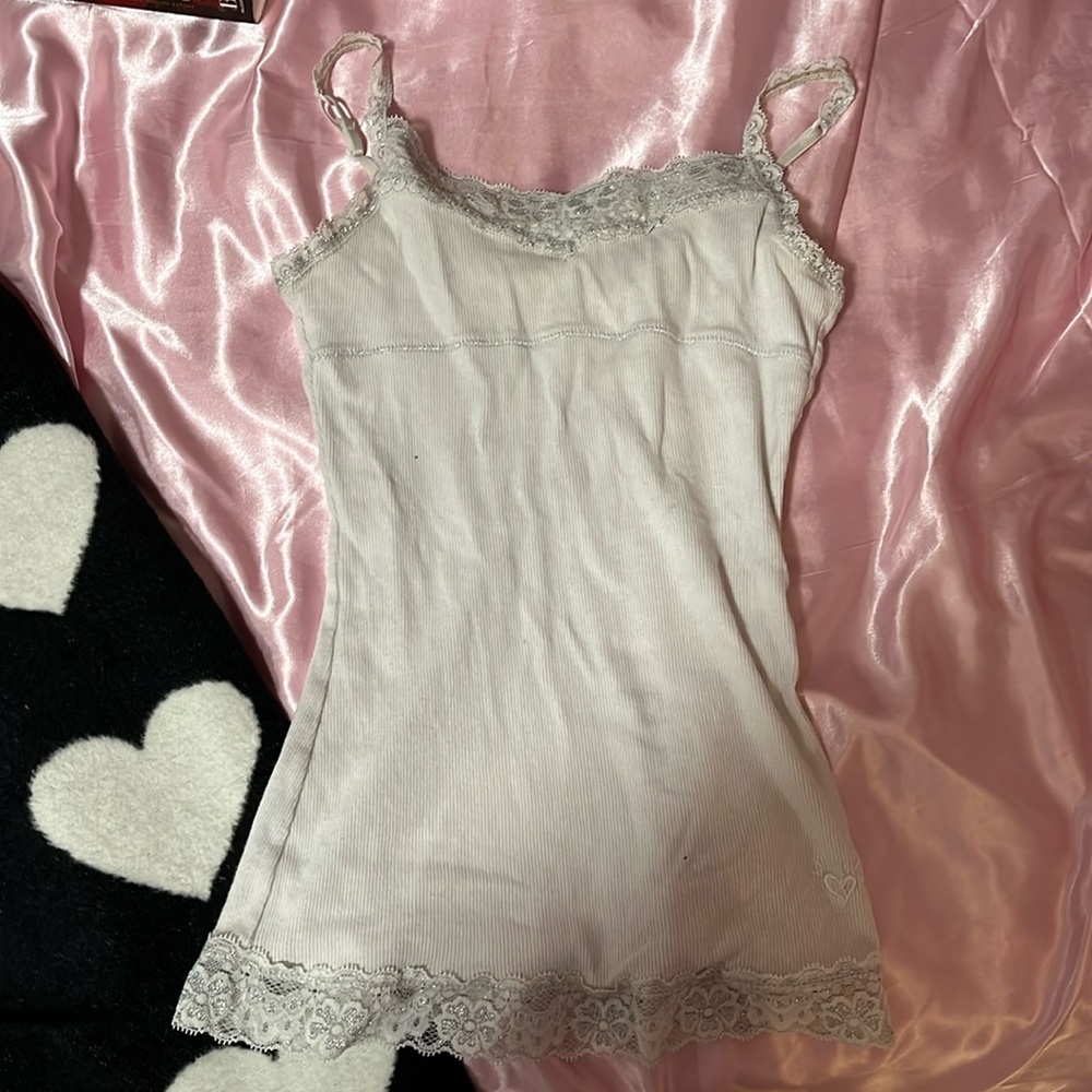 White tank top with lace at the top and bottom